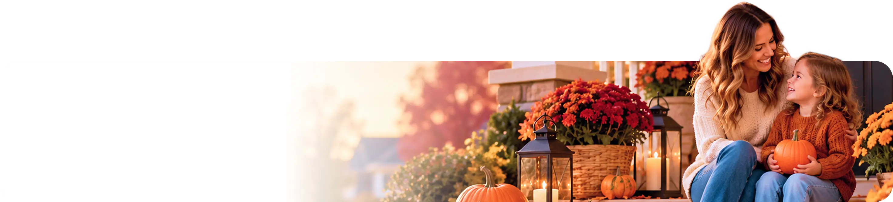Mother and daughter smiling on a festive autumn porch